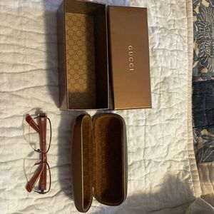 Gucci glasses (unknown prescription ), eyeglass case, box & in great condition.